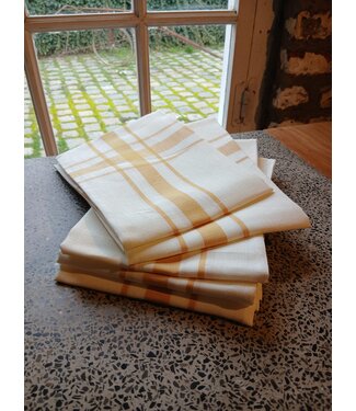 Traditional white and yellow linen tea towel