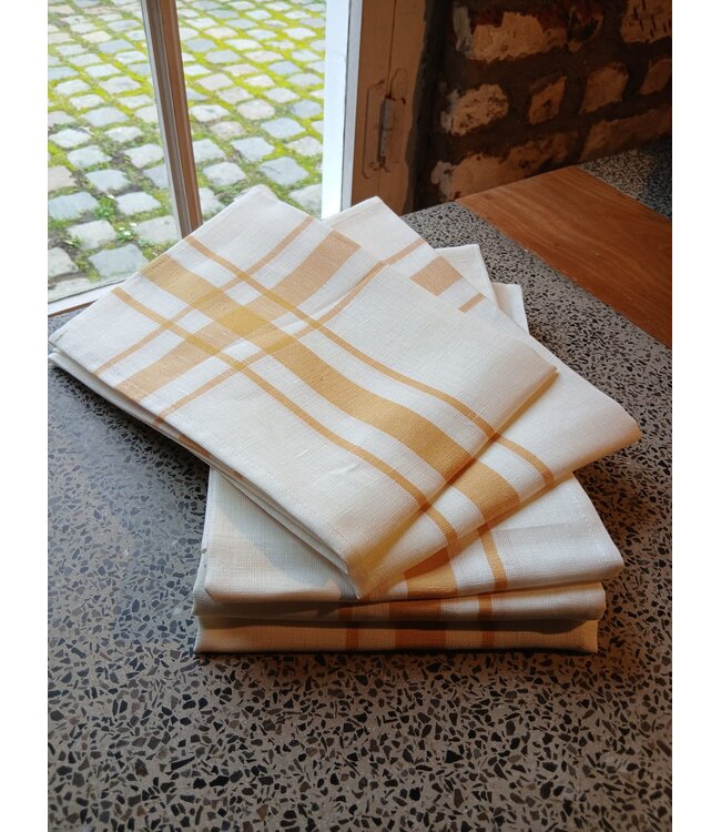 Traditional white and yellow linen tea towel