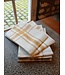 Traditional white and yellow linen tea towel