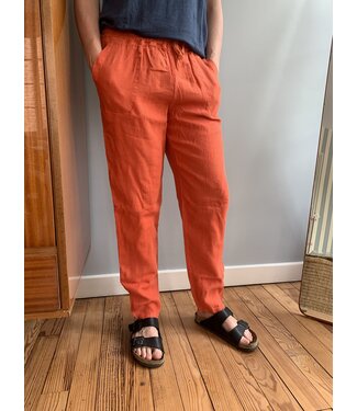 Unisex relaxed-fit linen trousers in burnt earth
