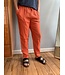Unisex relaxed-fit linen trousers in burnt earth