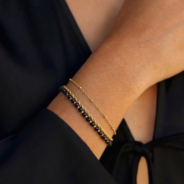 Midnight Twist armband - goud