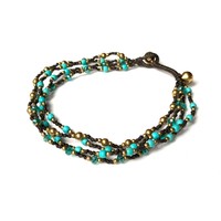 Enkelbandje met turquoise kraaltjes Enkelbandje met turquoise kraaltjes