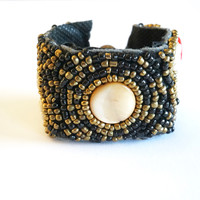 Isla Ibiza klemarmband schelpjes multicolor Isla Ibiza klemarmband schelpjes multicolor
