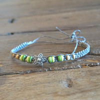 Armbandje / enkelbandje rodium bloemetje Armbandje / enkelbandje rodium bloemetje