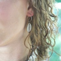 Oorbellen sea shell zilverkleurig Oorbellen sea shell zilverkleurig