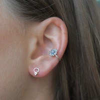 Earcuff zilveren zonnebloem Earcuff zilveren zonnebloem