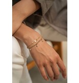 Zusss Elastieken kralenarmbandje met blokjes saliegroen/goud