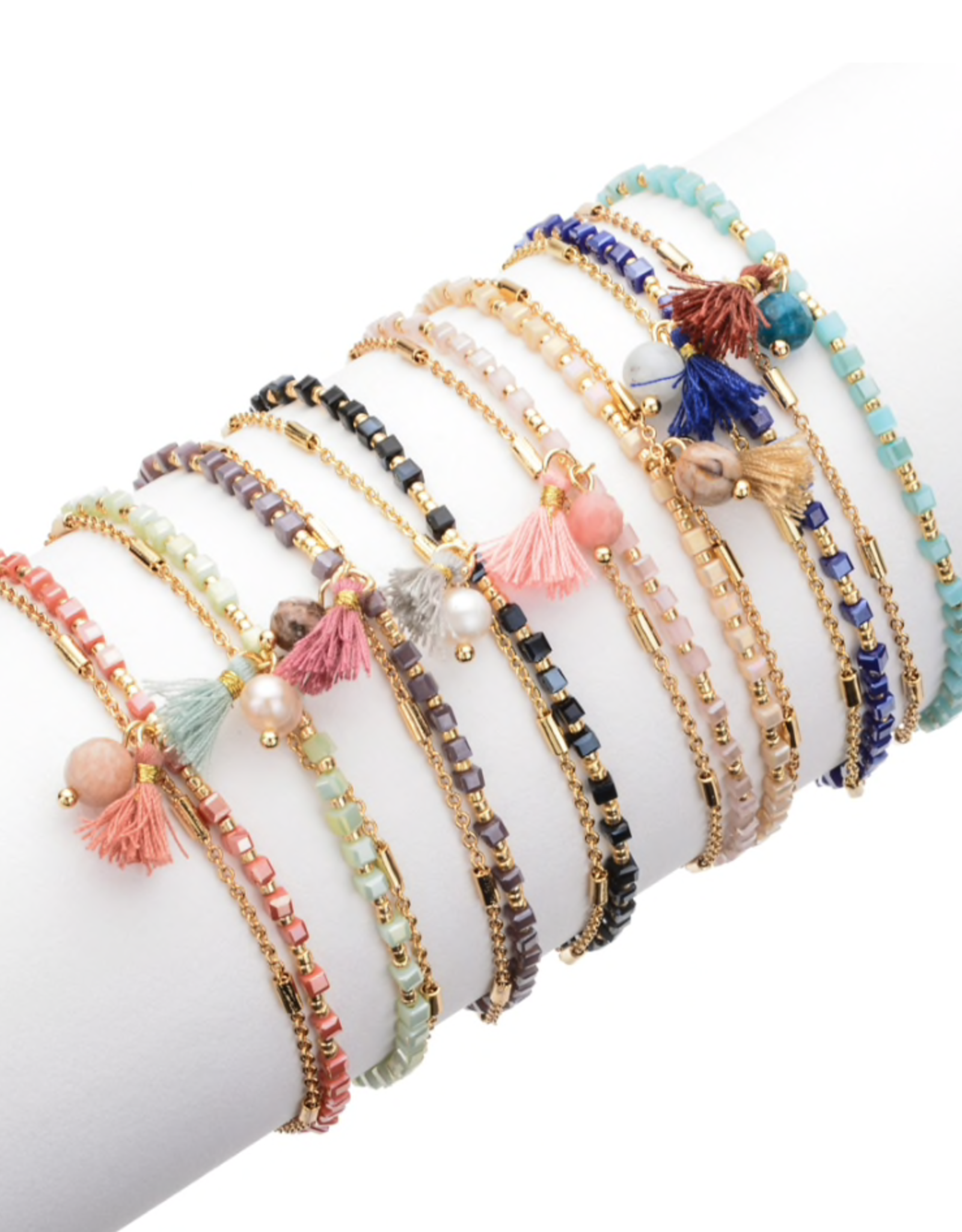 Gouden armband met roze koraal kralen