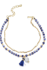 Gouden armband met navy kralen