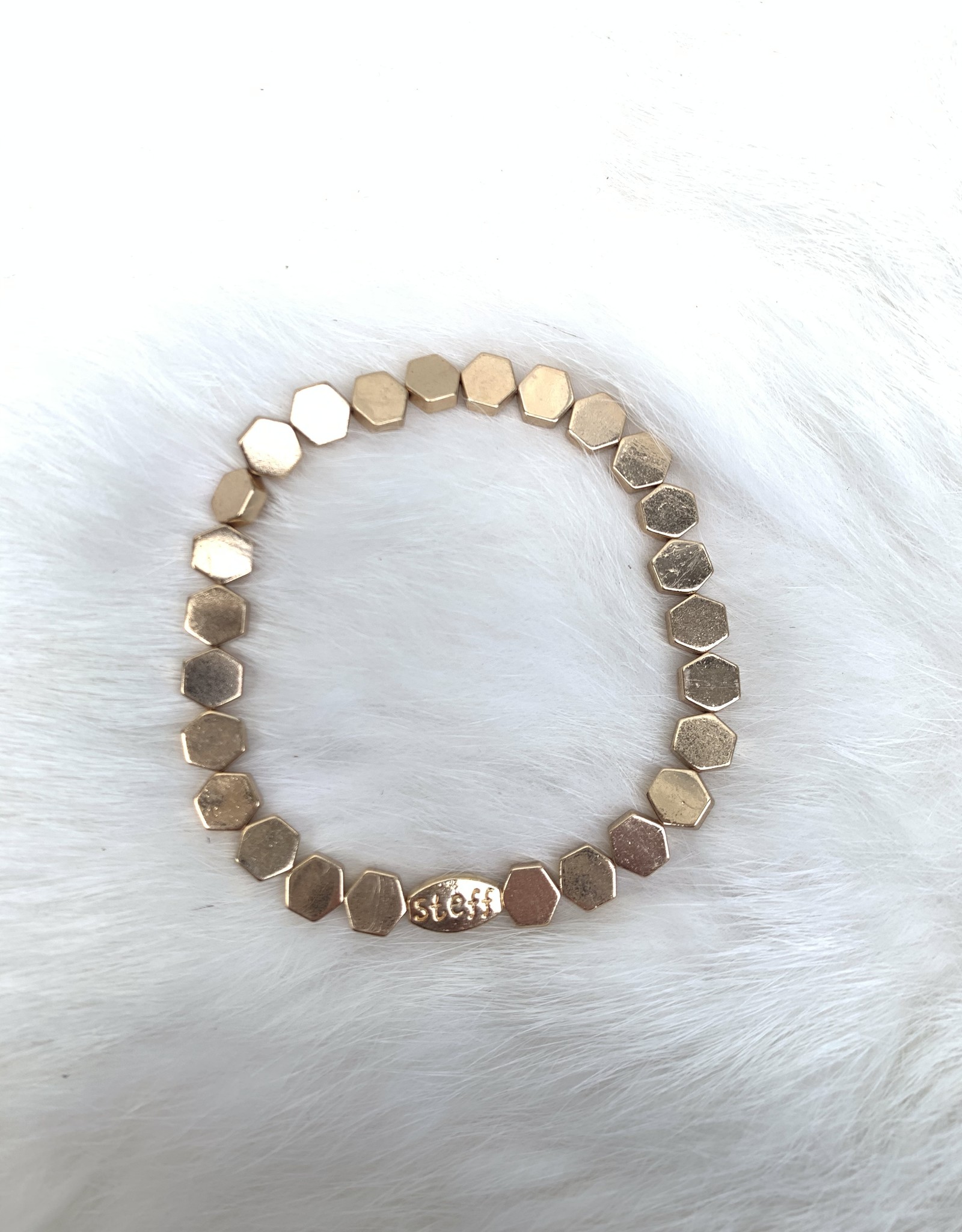 Kralenarmbandje goud