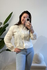 Creme blouse met broderie bloemen