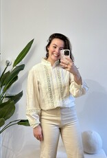 Creme blouse met broderie kant