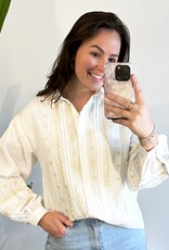 Witte blouse met creme borduursel
