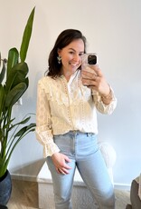 Creme blouse met broderie ruffle