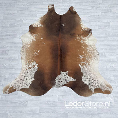 Cowhide brown white speckled on floor