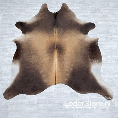 Cowhide brown white on floor