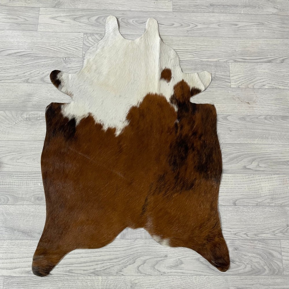 Lederstore Kleine koeienhuid bruin wit zwart (Normandiër) 90x60cm