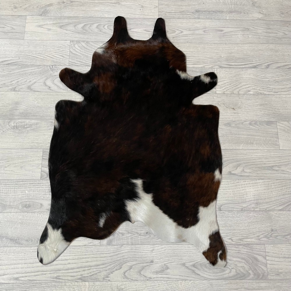 Lederstore Kleine koeienhuid bruin wit zwart (Normandiër) 90x60cm
