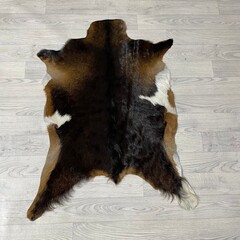 Geitenhuid bruin zwart wit 95x75cm