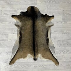 Geitenhuid bruin zwart wit 85x65cm