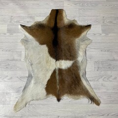 Geitenhuid bruin zwart wit 95x75cm