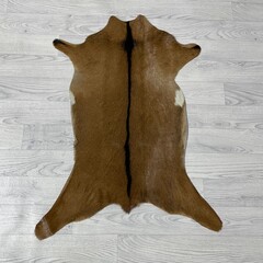 Geitenhuid bruin zwart wit 85x65cm