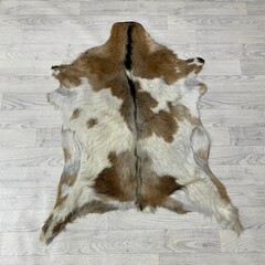 Geitenhuid bruin zwart wit 105x90cm