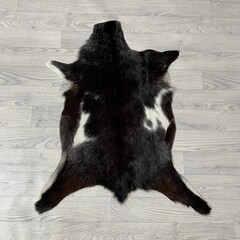 Geitenhuid bruin wit 85x70cm