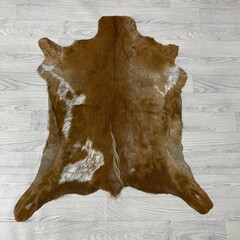 Geitenhuid bruin wit 95x85cm