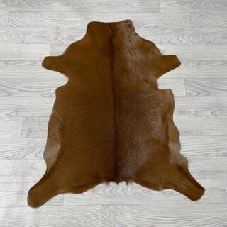 Geitenhuid bruin wit 90x75cm