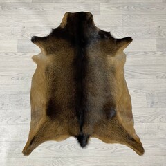 Geitenhuid bruin zwart 95x75cm