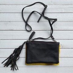 Tas Carol Springbok geel 23x15cm