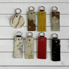 Sleutelhangers van Koeienhuid & Springbok 10x4cm (8 stks)