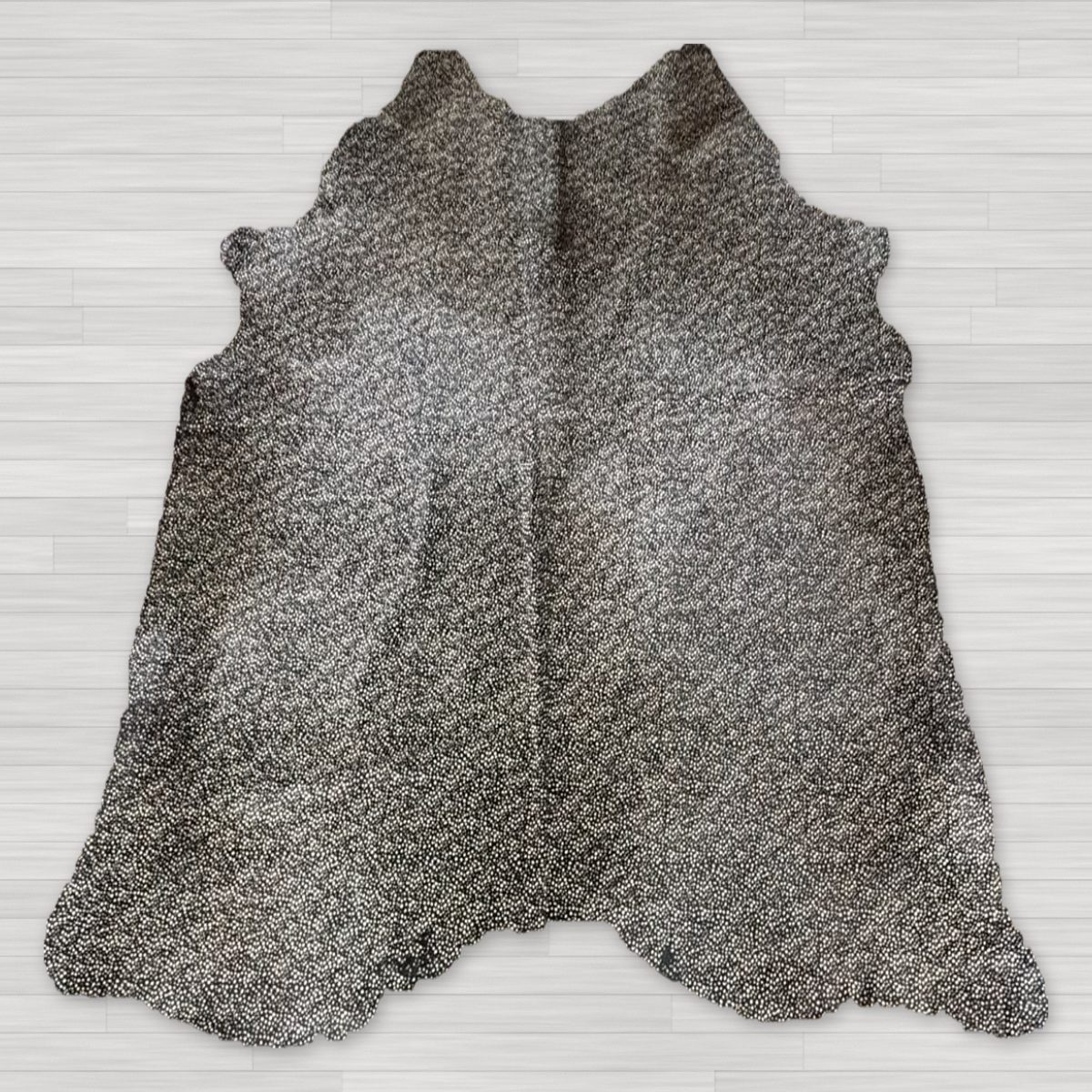 Koeienhuid reverse print zwart met witte vlekjes