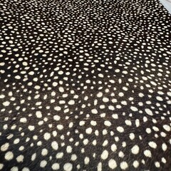 Koeienhuid reverse print zwart met witte vlekjes