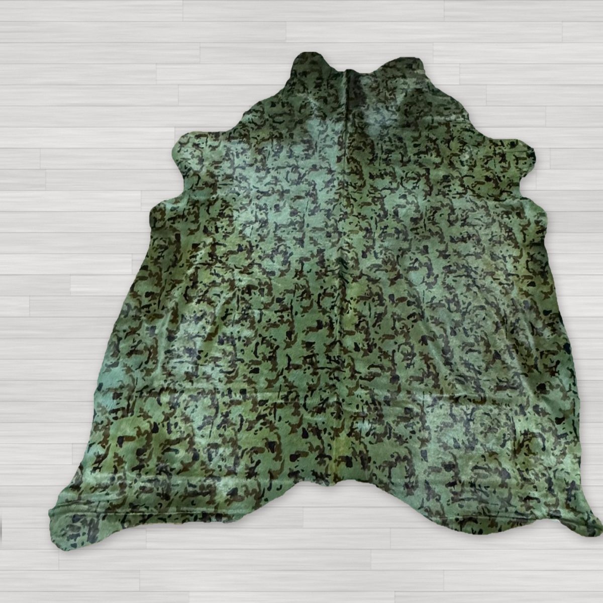 Koeienhuid camouflageprint groen
