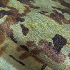 Koeienhuid camouflageprint groen