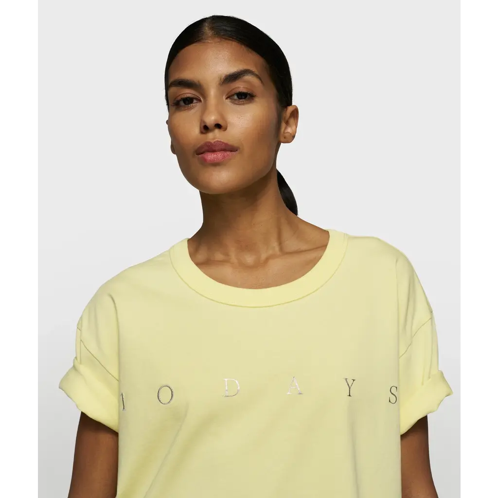 10 Days t-shirt logo in pastel yellow