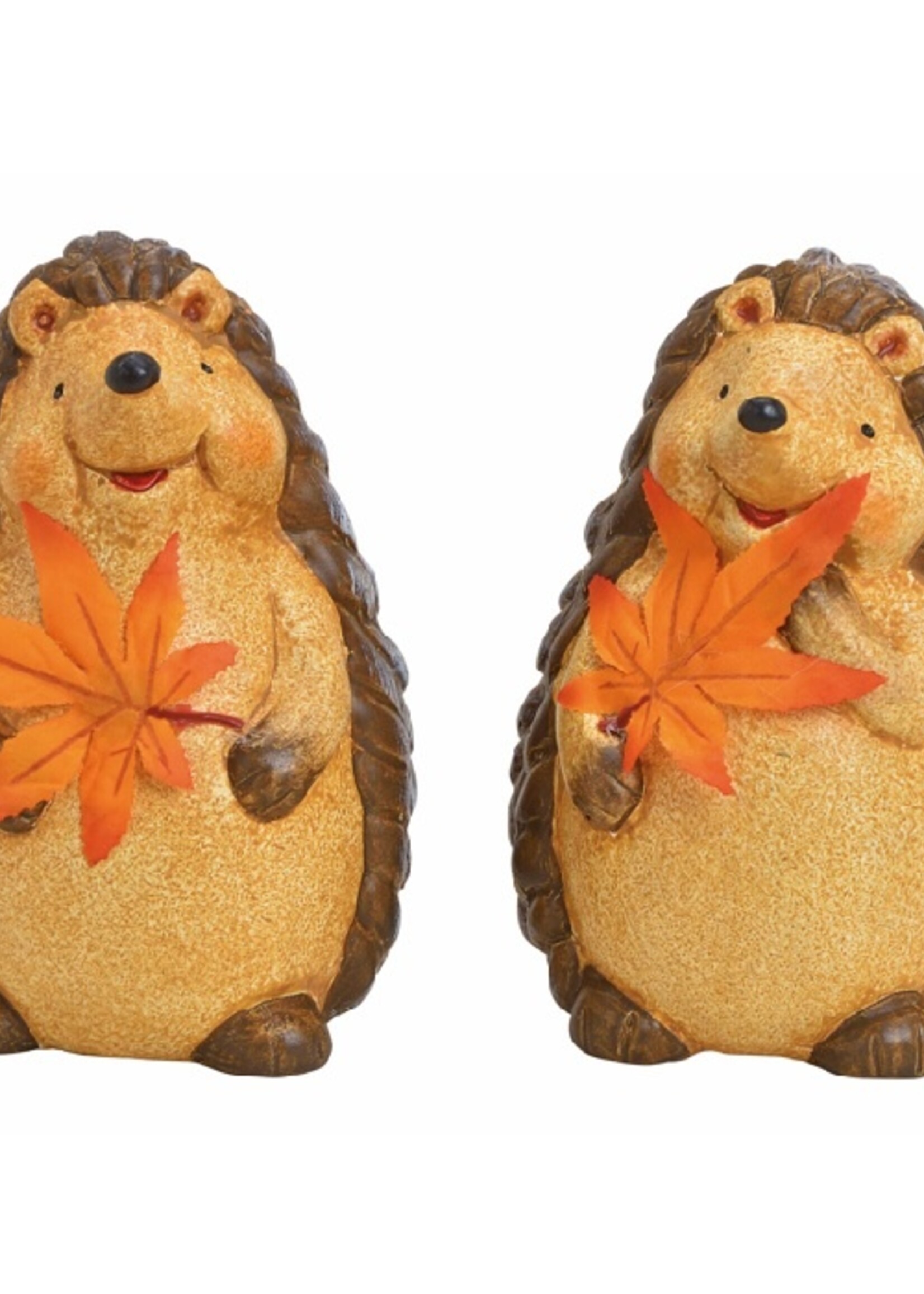 Twee egels met herfstblad gemaakt van keramiek