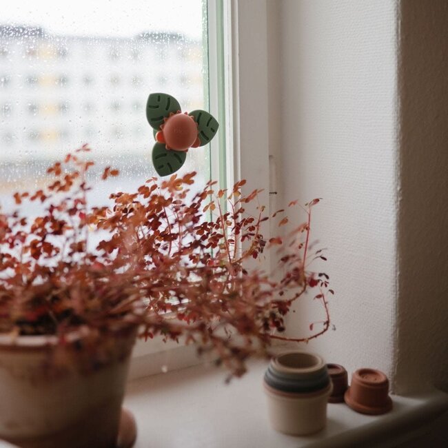 MUSHIE JOUET À VENTOUSE - FEUILLES TOURNANTES DINO
