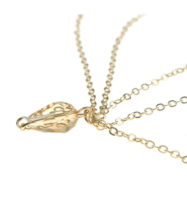 Haarketting goudkleurig met steen strass