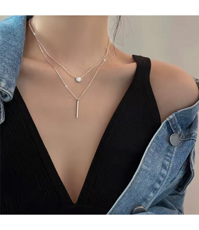 Ketting zilverkleurig dubbel staaf cirkel