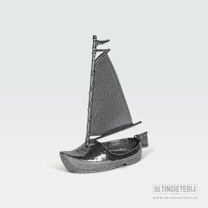 De Tingieterij Boot verstopfen