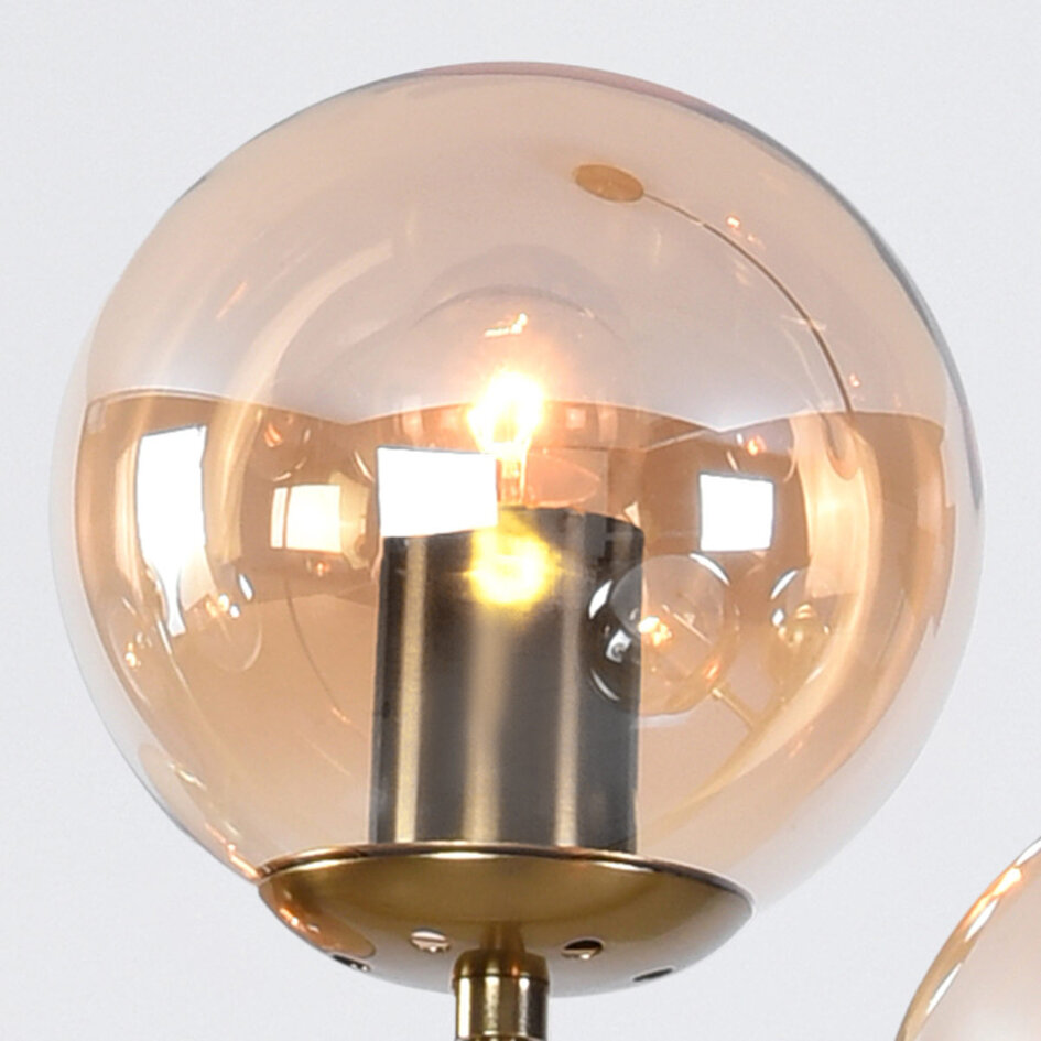 Suspension design 7 lumières Sette - verre ambré et doré