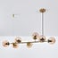 Suspension design 7 lumières Sette - verre ambré et doré
