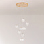 Suspension Aedon 8 lumières - globes blancs aux détails dorés