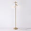 Lampadaire luxueux Zhan en doré à trois spots pivotants et variateur tactile