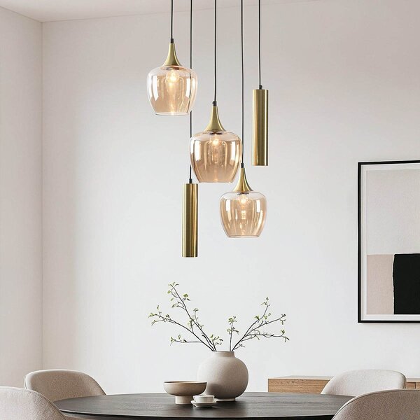 Suspension design Téo dorée avec trois abat-jours en verre ambré et deux spots GU10