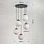 Suspension moderne Marbelle à 5 lumières - noir, globes en verre aspect marbre